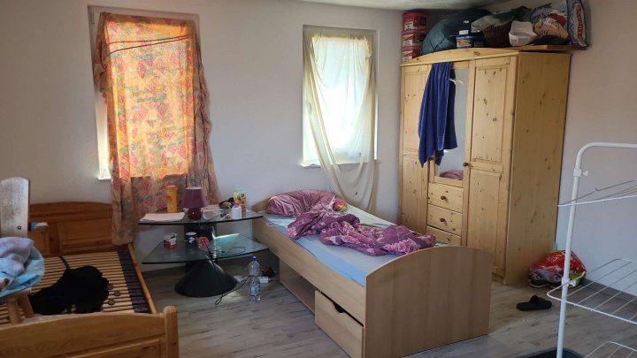 Sanierungsbedürftige Doppelhaushälfte mit Schuppen