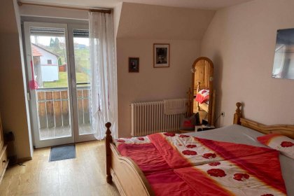Schlafzimmer mit Balkon