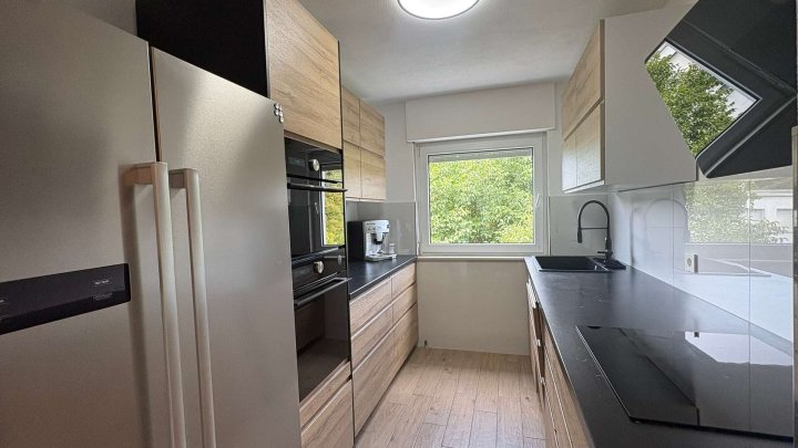 Großzügig wohnen mit Wintergarten & Balkon – modernisierte Eigentumswohnung mit Garage