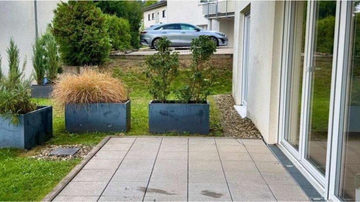 Moderne 3-Zimmer-Wohnung mit Terrasse, Einbauküche und Tiefgaragenstellplatz