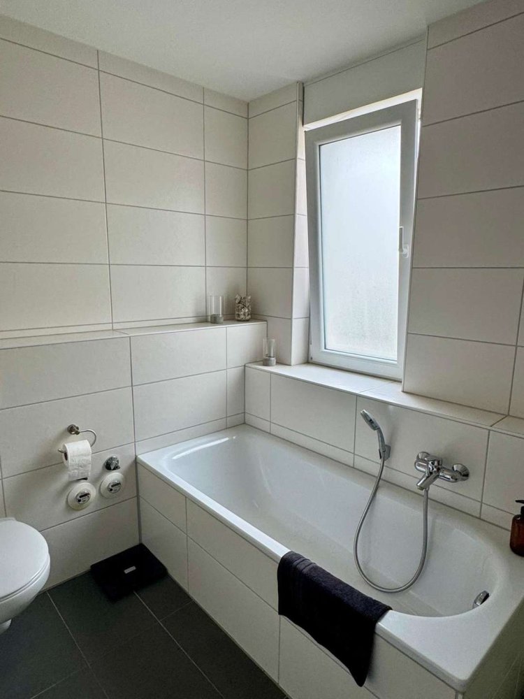 Moderne 3-Zimmer-Wohnung mit Terrasse, Einbauküche und Tiefgaragenstellplatz - Foto 5
