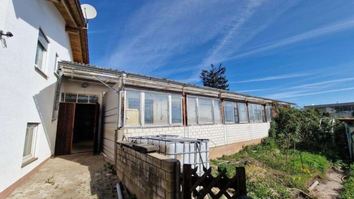 Potenzial ohne Ende! Großes Einfamilienhaus mit Werkstattgebäude, Garage & Garten