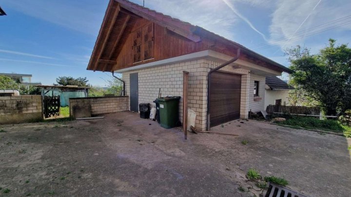 Potenzial ohne Ende! Großes Einfamilienhaus mit Werkstattgebäude, Garage & Garten